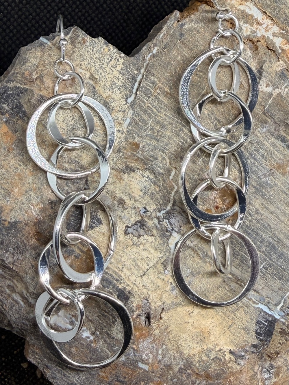 Modern cascading interlocking loops silver tone long trending earrings - Picture 2 of 3